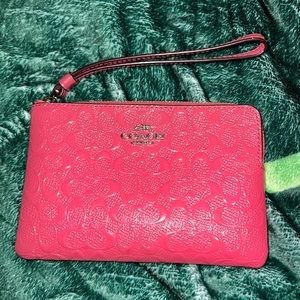 Pink Coach Embossed Wristlet